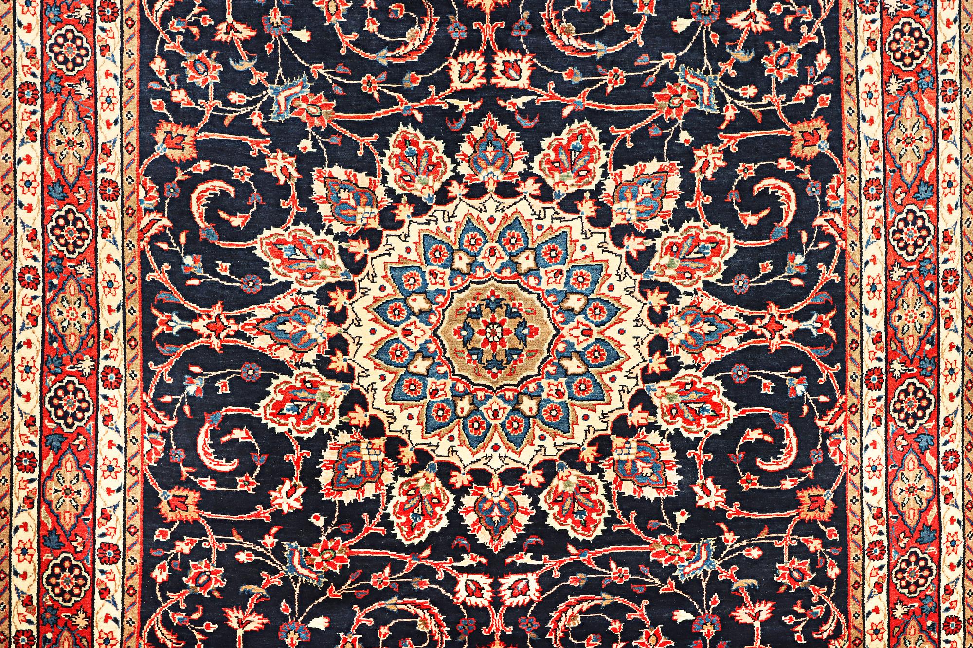 A Hamadan carpet, c. 312 x 216 cm.