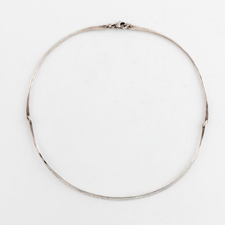 Annie Jägbeck silver necklace and earrings.