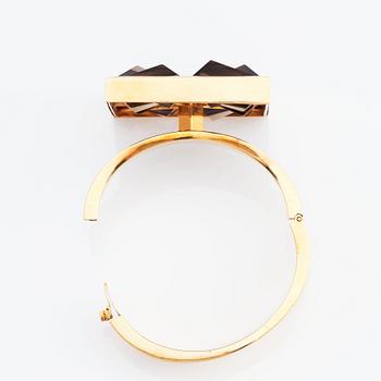 Sigurd Persson, an 18K gold and smoky qvartz  (citrine) bangle, Stockholm 1962.