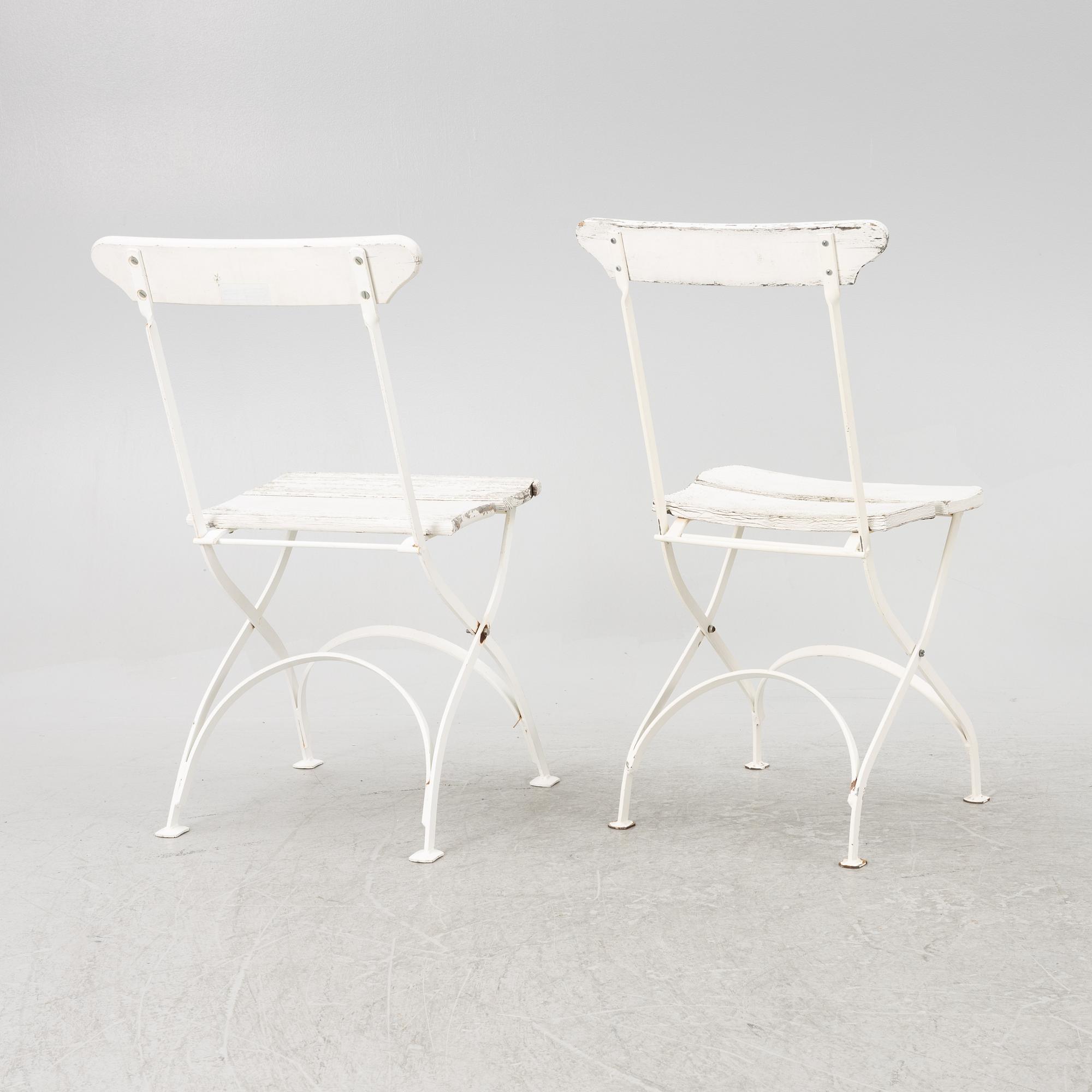 A set of seven garden chairs and two tables Byarums bruk, later part of the 20th century.