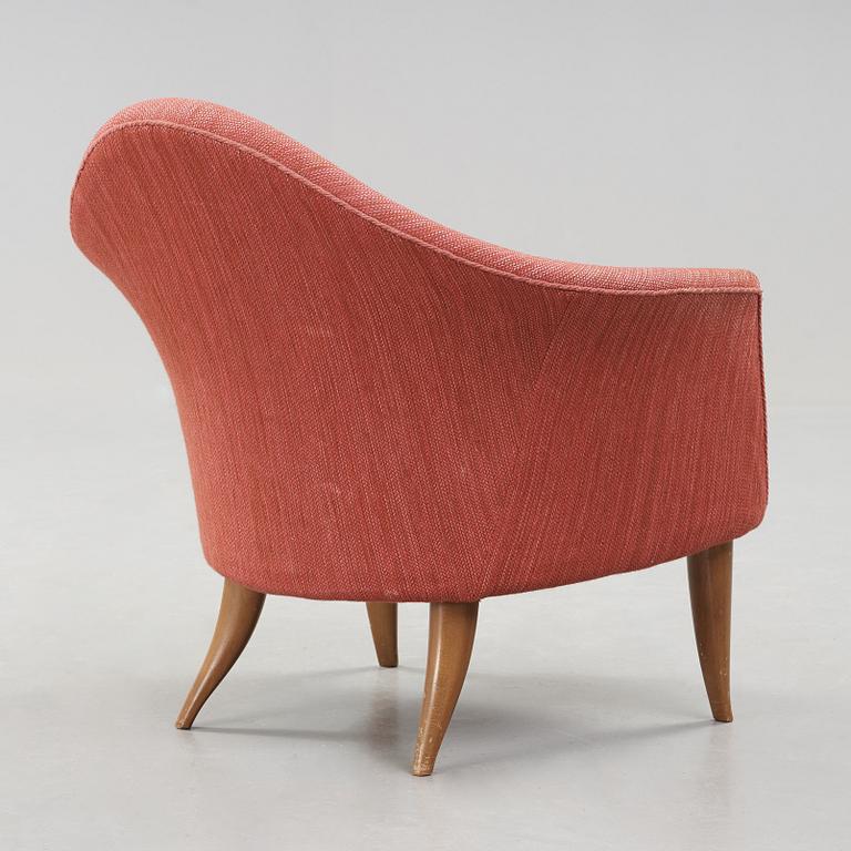 A chair "Lilla Adam" by Kerstin Hörlin-Holmquist.