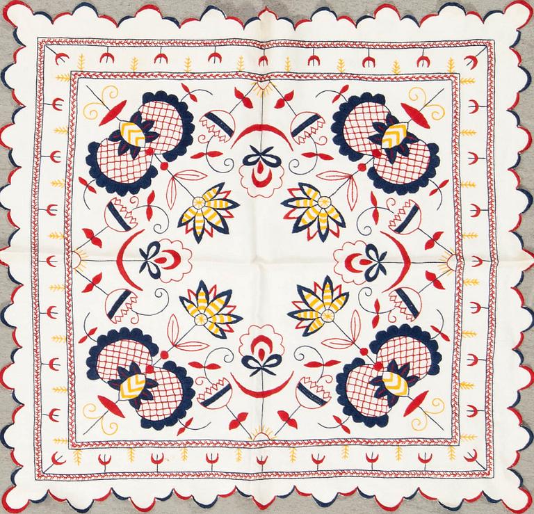 A collection of Christmas tablecloths, Christmas tree skirts, an apron, and runners, 21 pcs, 20th century.