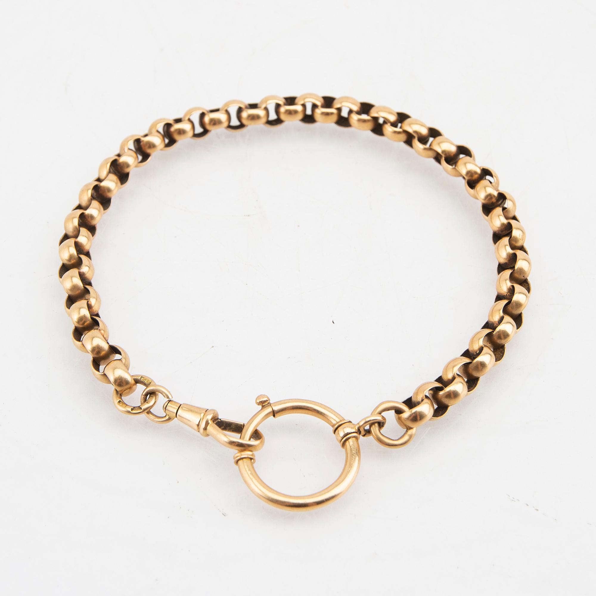 An 18K gold watch chain from year 1900.