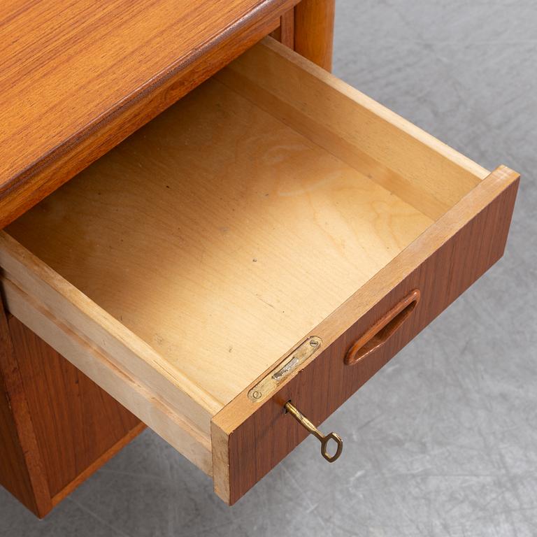 A 1950/60's oak and teak writing desk.
