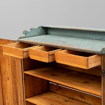 A first half of the 19th century painted cupboard.