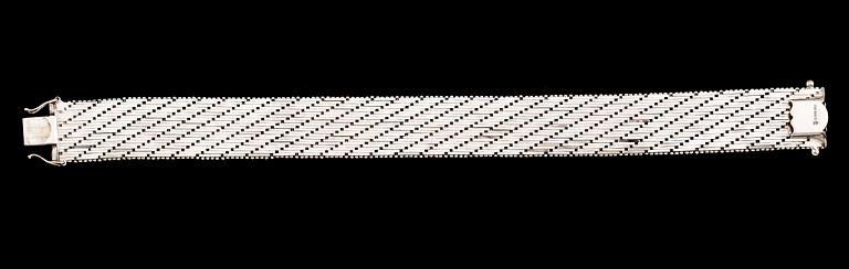 ARMBAND, 18 k vitguld. Vikt ca 59 g.