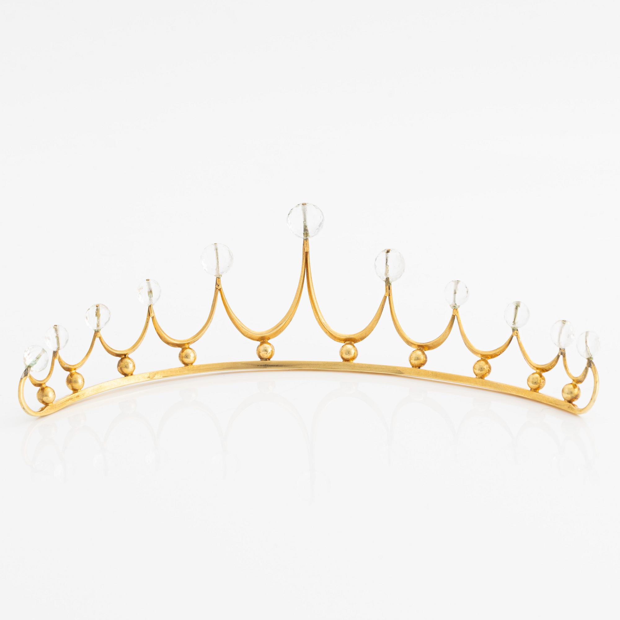 Tiara, gilded silver with faceted white topazes.