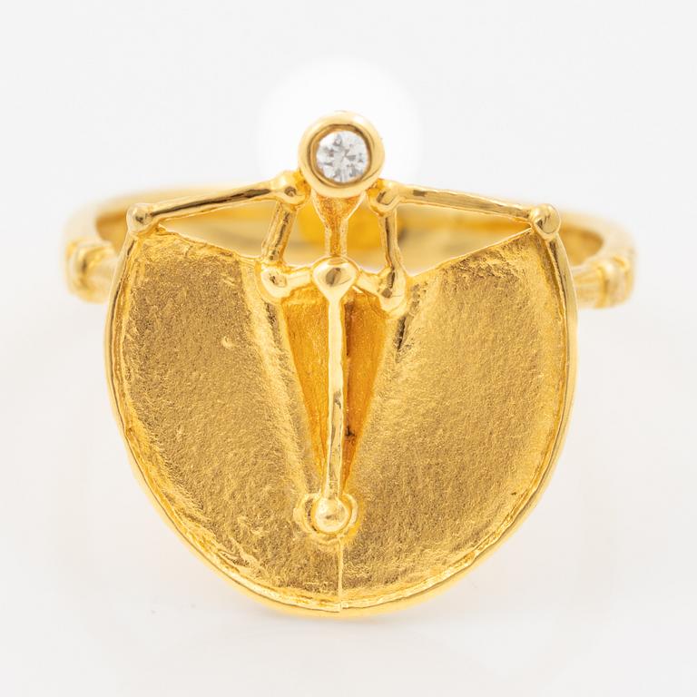 Ring, 18K guld med en rund briljantslipad diamant.