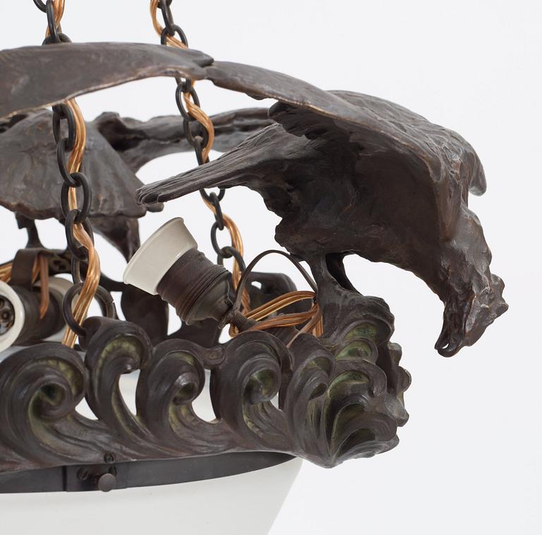 A Swedish Art Nouveau patinated bronze and patinated metal hanging lamp, reportedly designed by Ruth Milles.