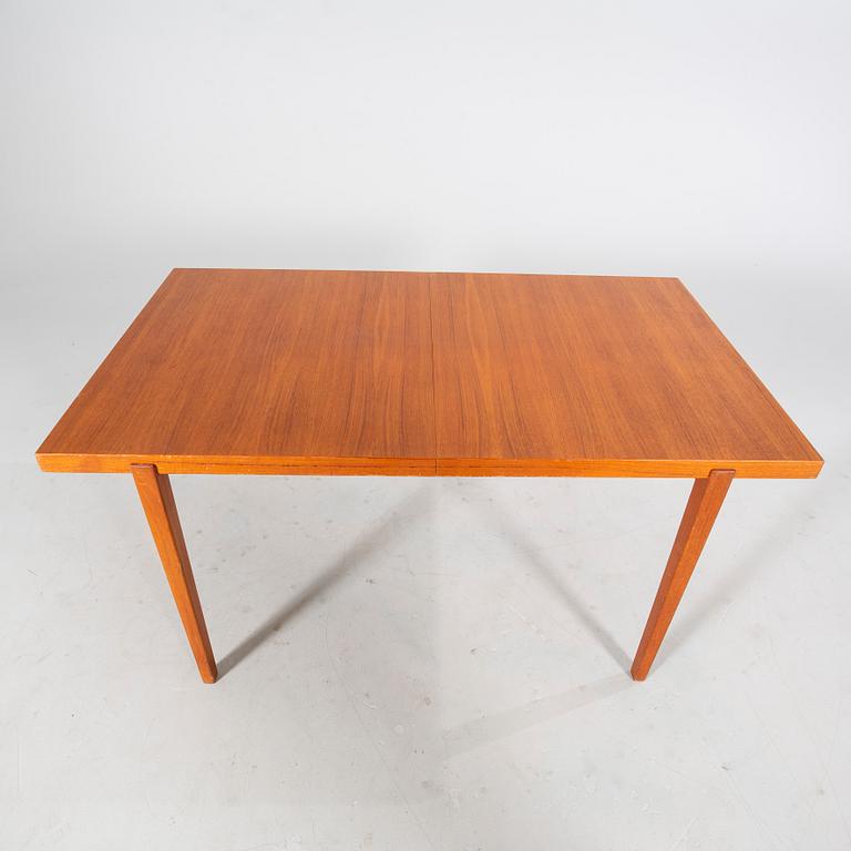 A mid 20th century dining table.