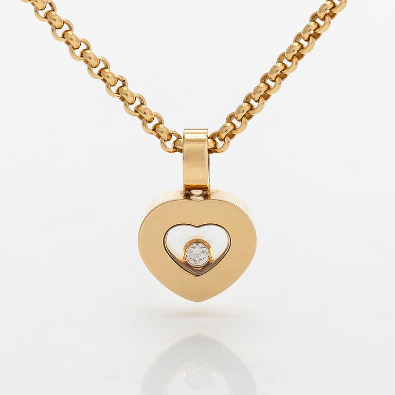 Chopard, an 18K gold 'Happy Diamonds' necklace with a heart pendant, and brilliant-cut diamond approximately 0.05 ct.