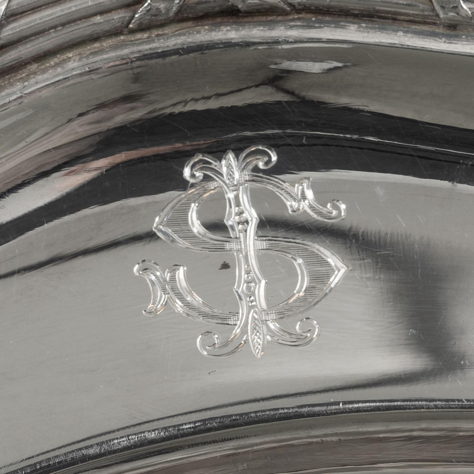 A set of seven silver plates (6+1), including GAB, Stockholm 1943.