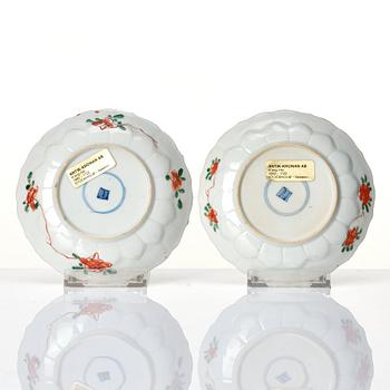 A pair of famille verte cups with stands, Qing dynasty, Kangxi (1662-1722).