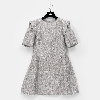 Chanel, a bouclé silver dress, size 34.