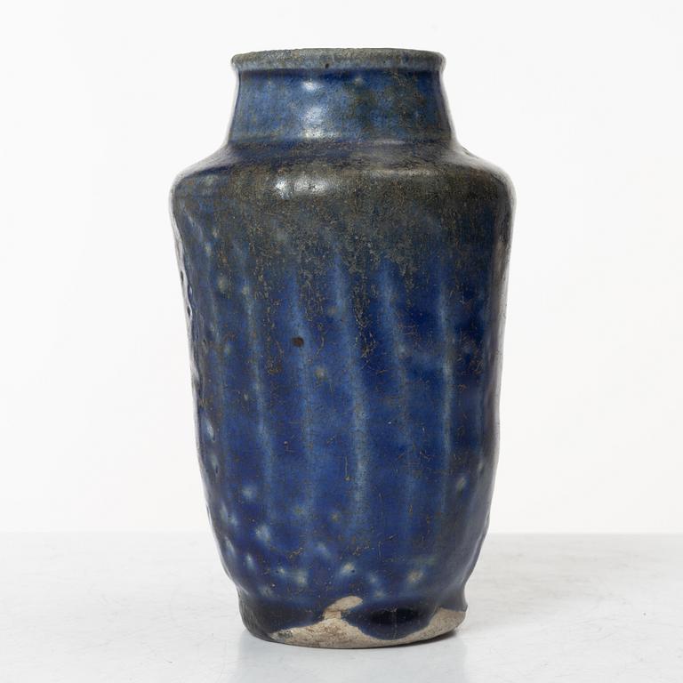 A Kashan pottery vase, central Persia 13th century.