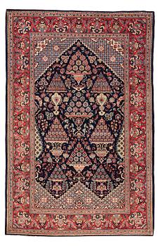 303. A rug, semi-antique, Kashan, ca 206,5 x 134,5 cm.