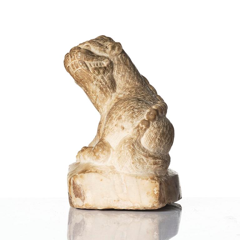 A stone figure of a mythical beast, probably Tang dynasty (618-907).