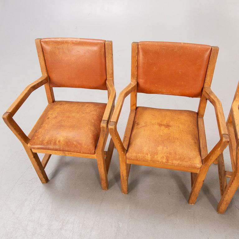 A set of four 1970:s Tage Poulsen Daumiller oak and leather armchairs for GM Möbler Denmark.