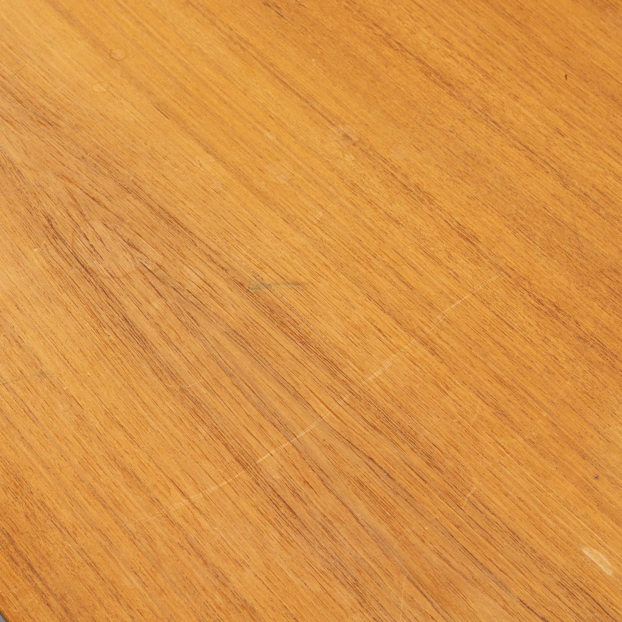 A 1960's teak writing desk.