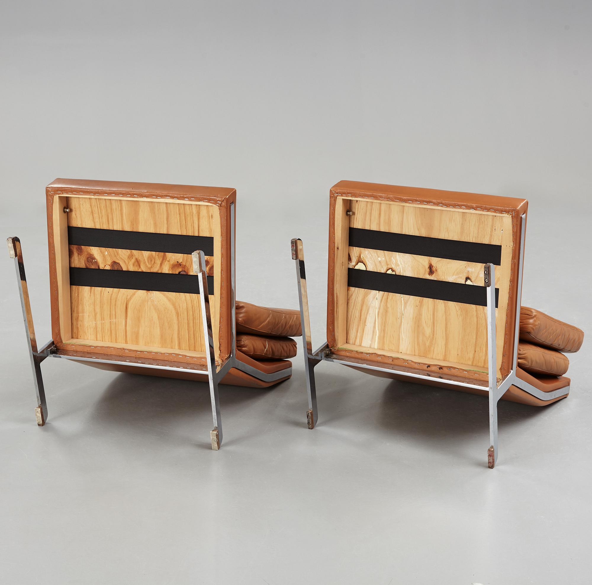 A pair of Poul Nørreklit chromed steel and brown leather easy chairs, Selectform, Denmark 1960's.