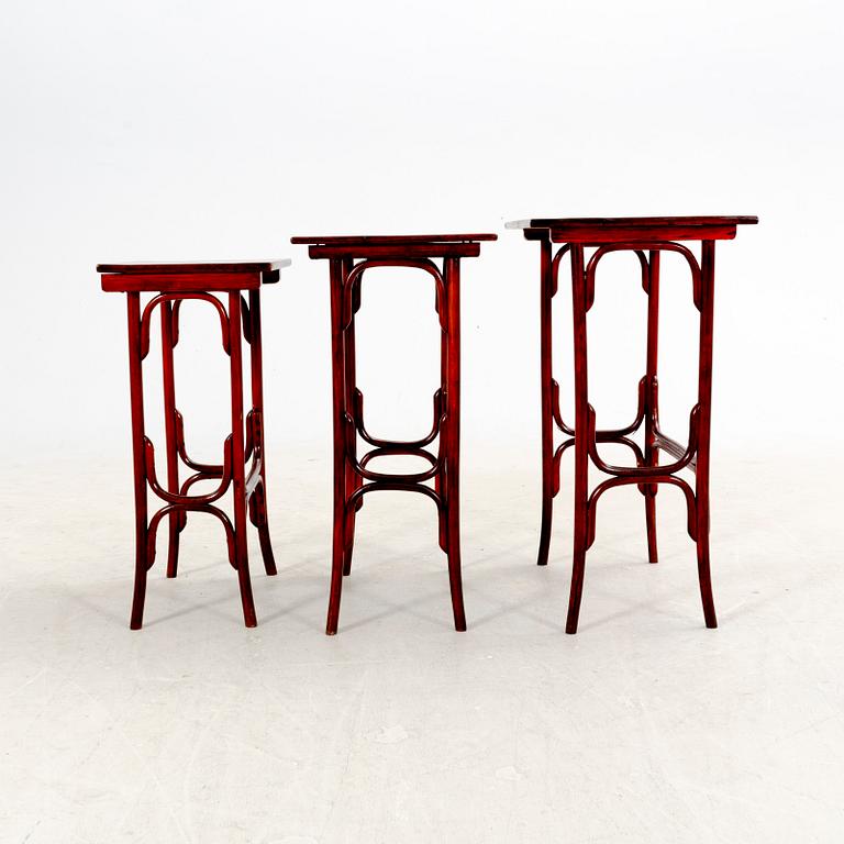 A three-part nesting table first part of the 20th Century.