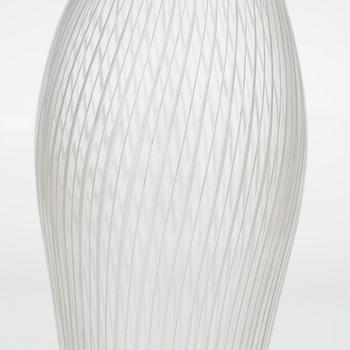 Tapio Wirkkala, four line-cut clear glass vases, signed Tapio Wirkkala Iittala.