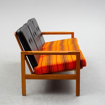 A 1960s sofa and easy chair.