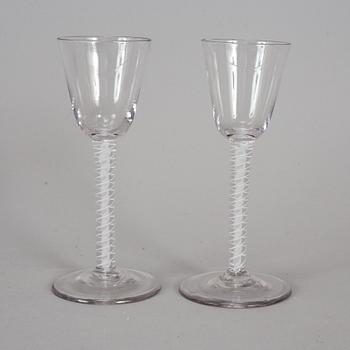 A pair of 18th century wine glasses.