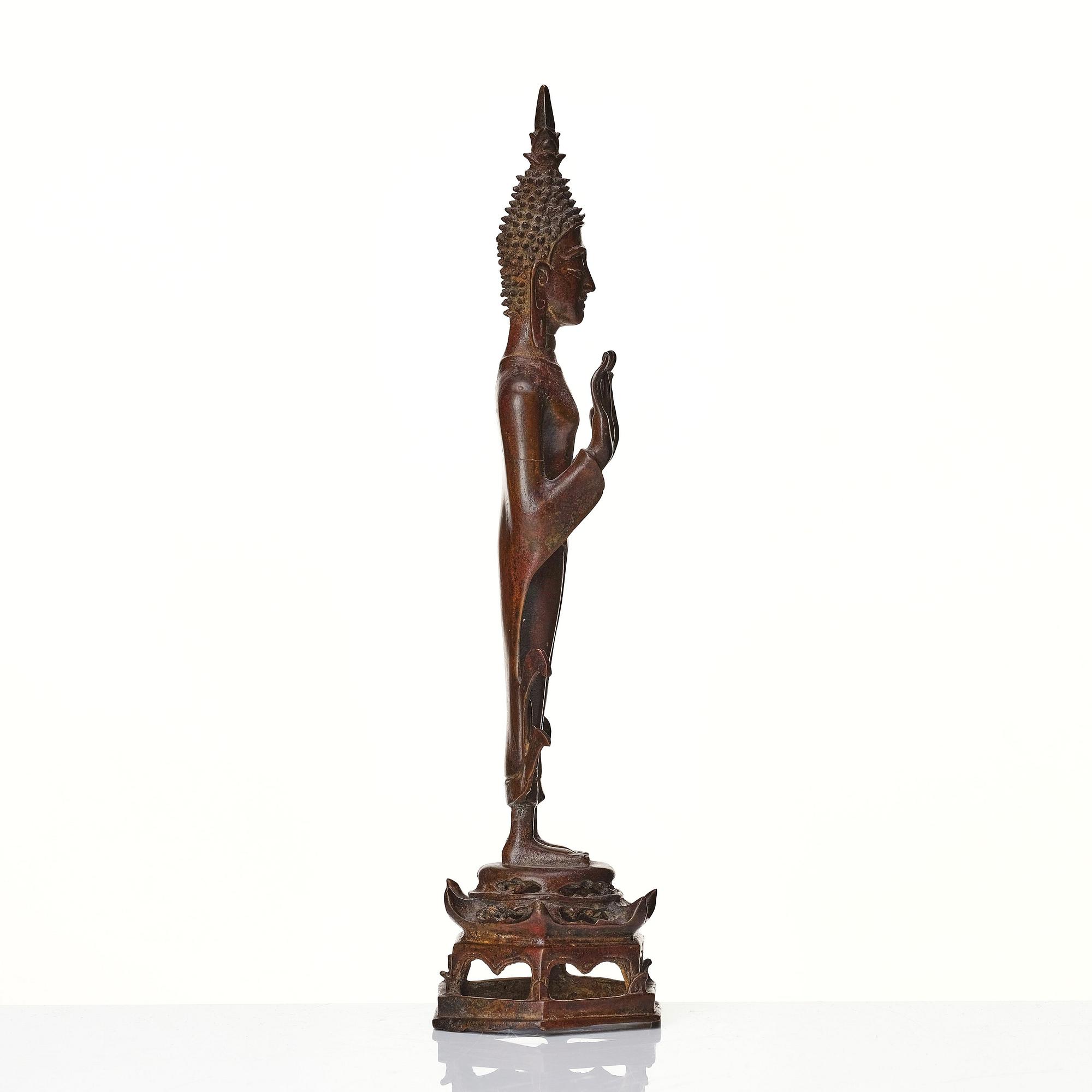 A standing sculpture of buddha, Laos, 18th Century.