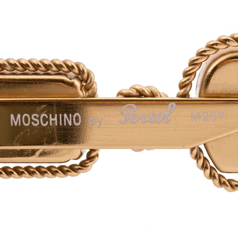 MOSCHINO, a pair of sunglasses.