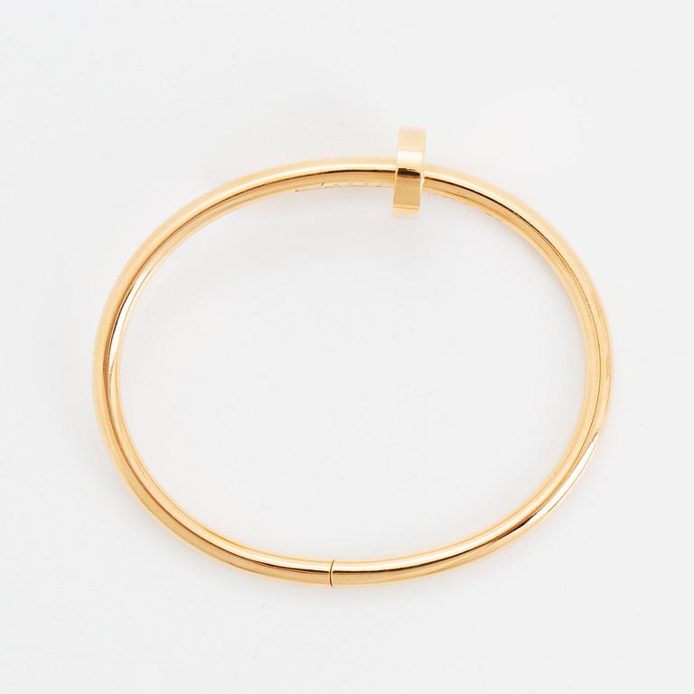 A Cartier "Juste en Clou" bracelet in 18K gold.