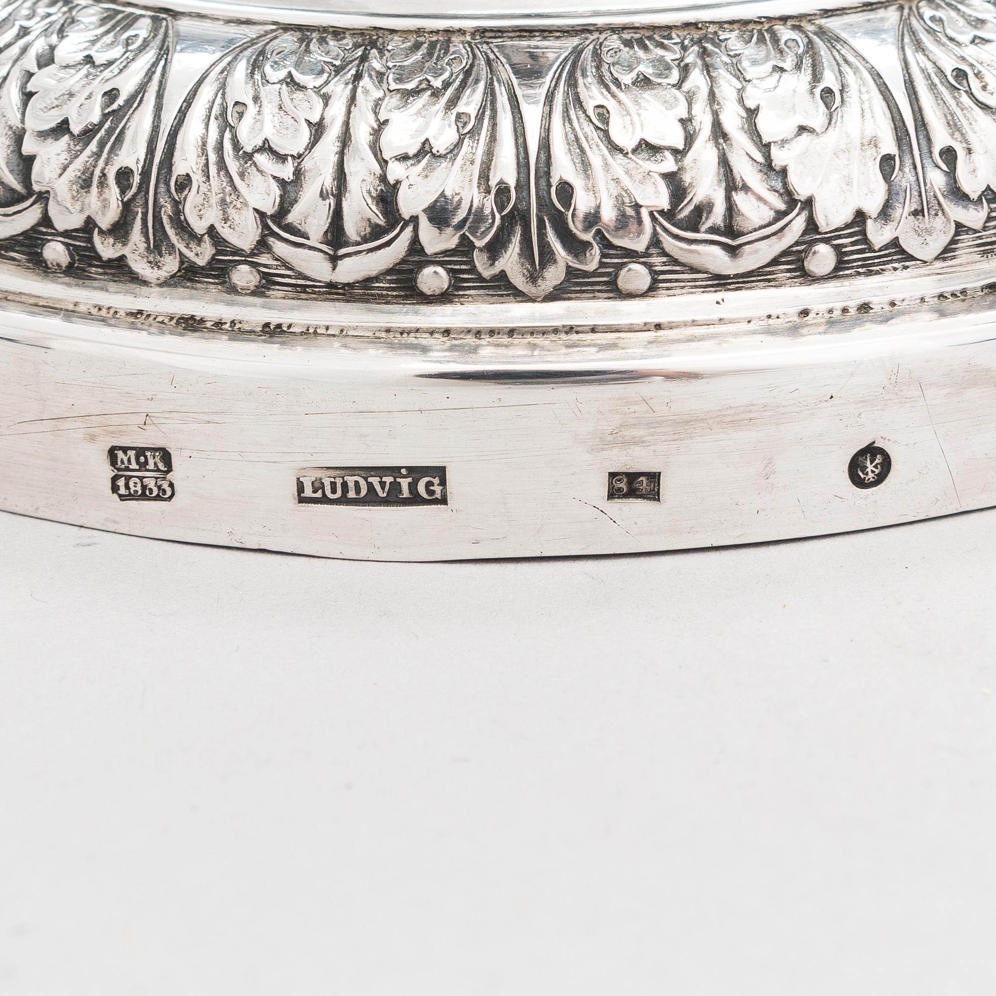 Johann Wilchelm Ludwig, A pair of Russian silver candlesticks, marked Ludvig, Saint Petersburg, 1833.