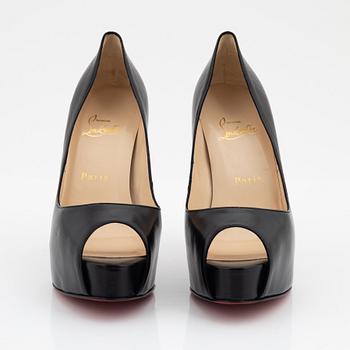 Christian Louboutin, a pair of black leather peep toe pumps, size 37 1/2.
