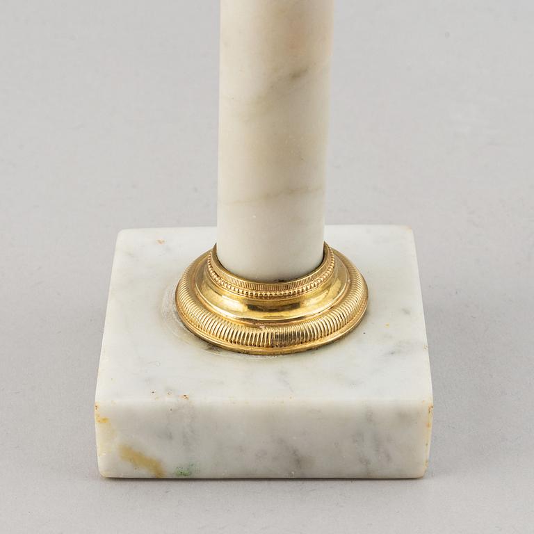 A pair of late-gustavian candlesticks, around year 1800.