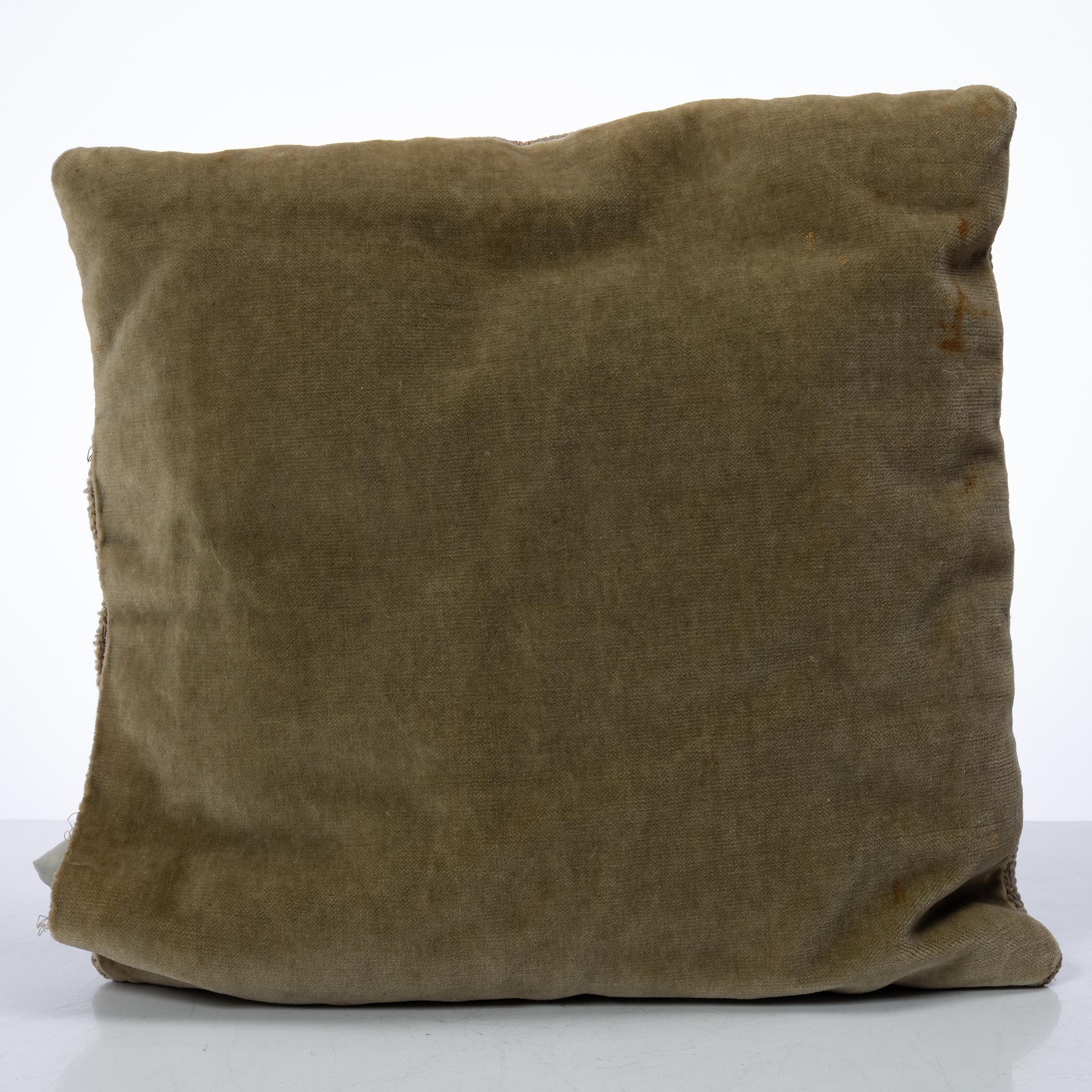 Märta Måås-Fjetterström, a cushion, 'Blommor på röd botten', signed AB MMF, ca. 31 x 31 cm.