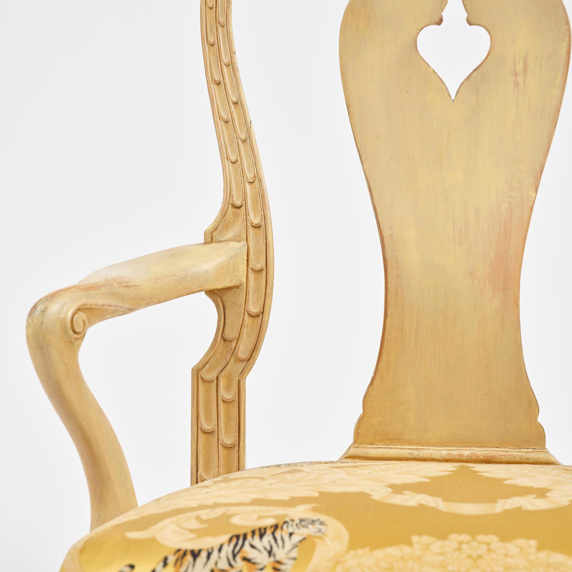 A rococo open armchair in the manner of C M Sandberg, Stockholm, later part 18th century.