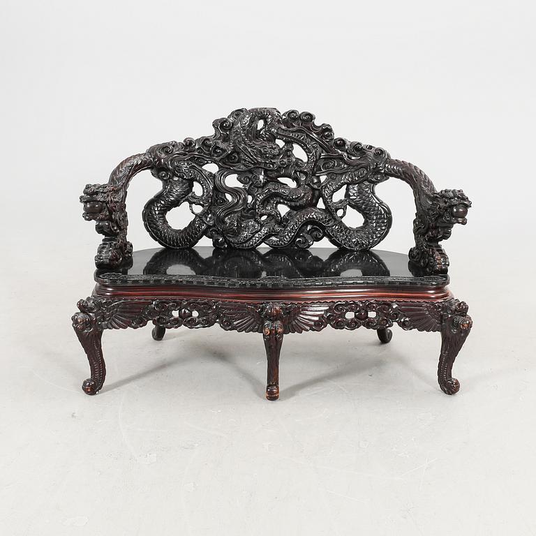 A Chinese wooden sofa 20th century.