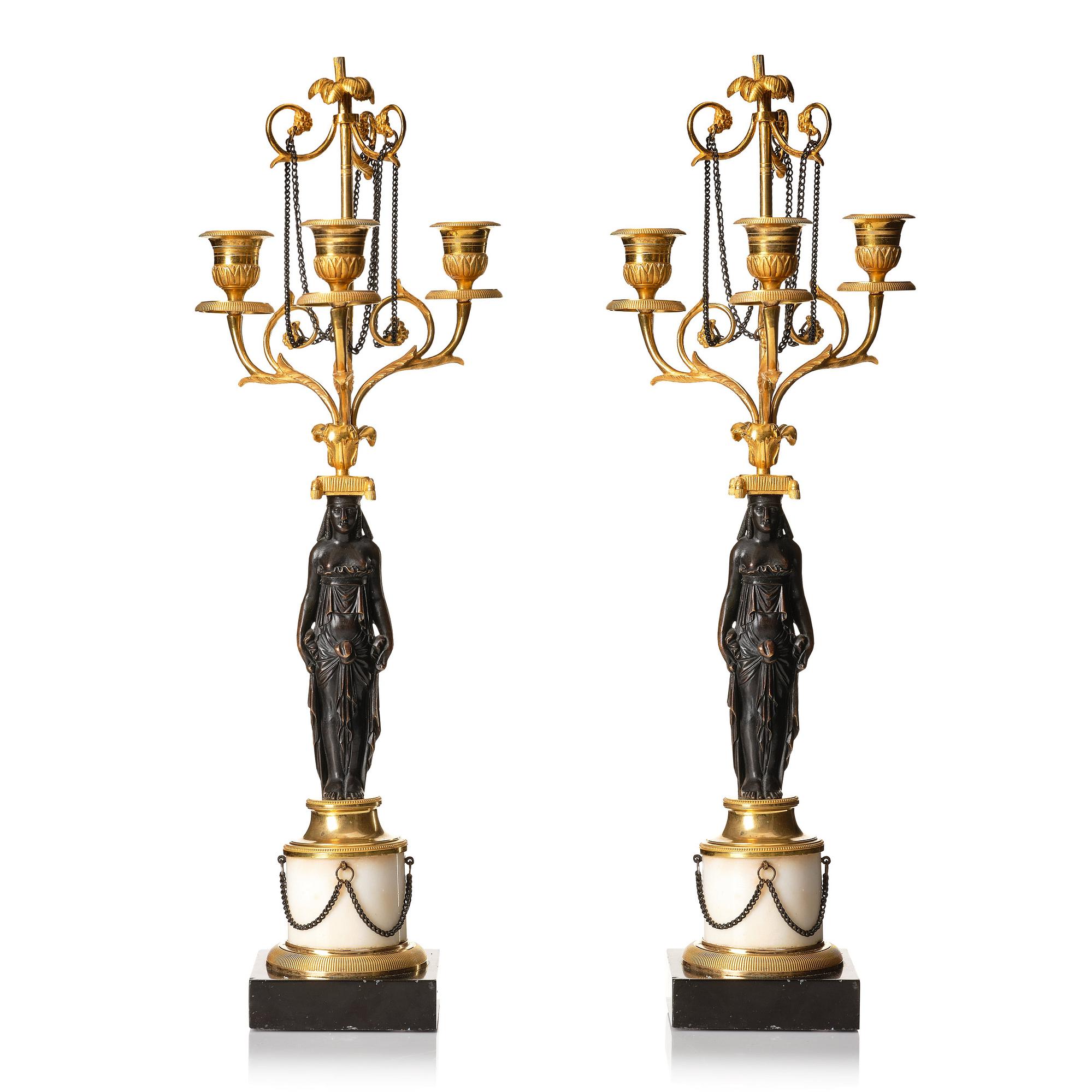 A pair of late Gustavian circa 1800 three-light candelabra, attributed to F L Rung.