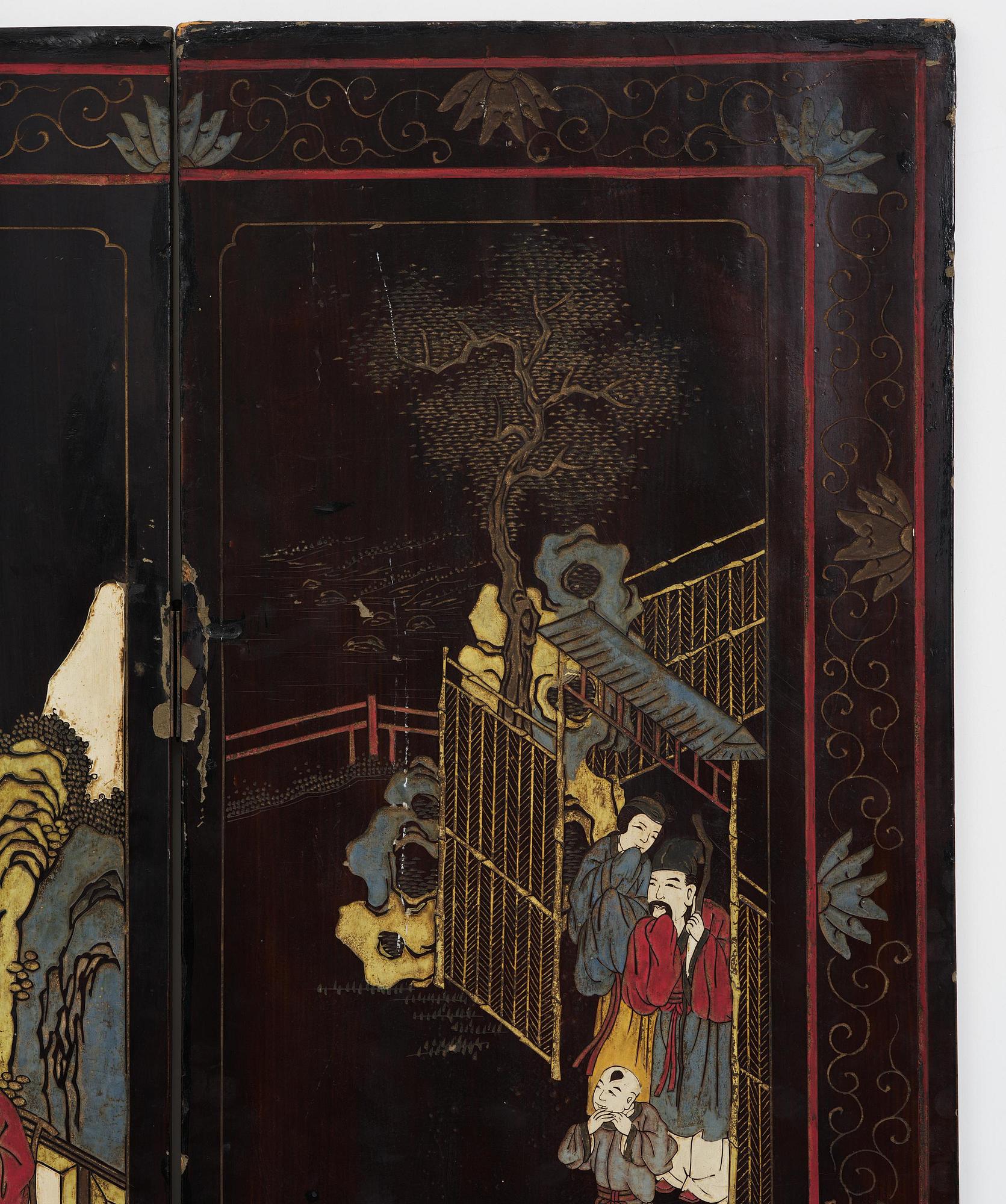 A Chinese four panel lacquer folding screen, first part of the 20th century.