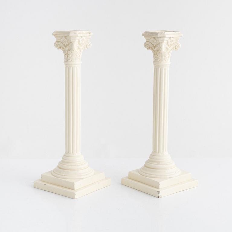 A pair of creamware candlesticks, around 1900.