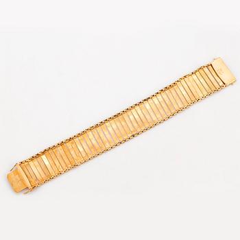 BRACELET, 18K gold with engraved decor.