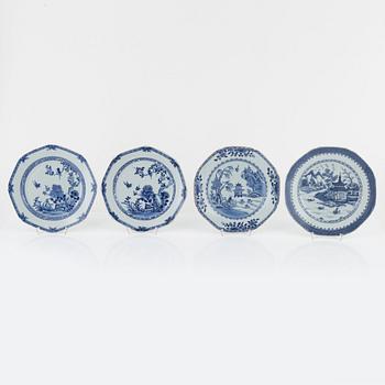 A group of seven Chinese porcelain plates and a charger, 18th / 19th Century.