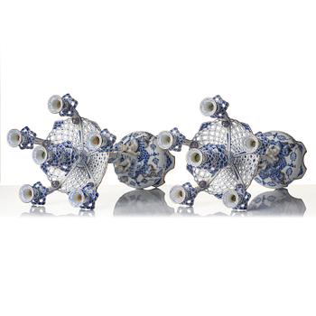 A pair of Royal Copenhagen 'Musselmalet' / 'blue fluted full lace' six-light candelabras, Denmark, 1898-1923.