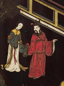 A Chinese four panel lacquer folding screen, first part of the 20th century.