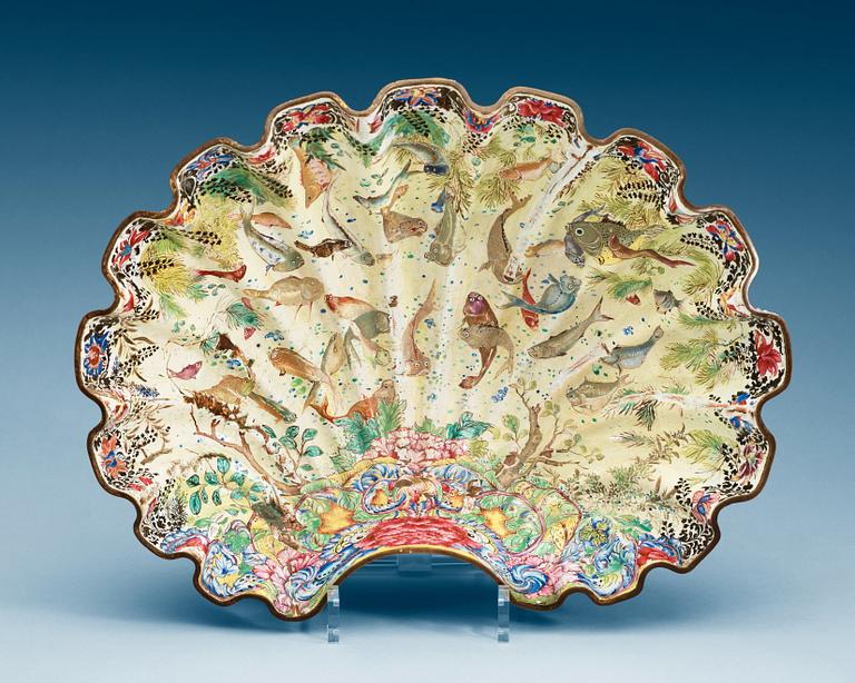 An enamel on copper clam-shaped bowl, Qing dynasty, 18th Century.