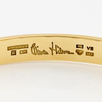 Wiwen Nilsson, a bracelet, 18K gold with step-cut rock crystal, Lund 1947.