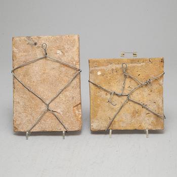 Two ceramic tiles.