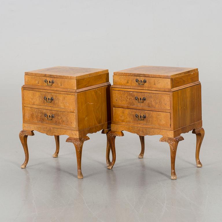 A pair of Rococo-style bedside tables.