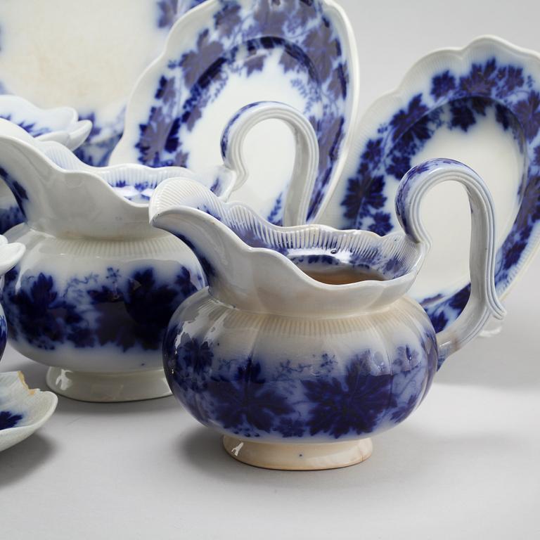 77 pieces of earthenware tableware by Arthur Percy for Gustavsberg, model "Vinranka", first half of the 20th century.