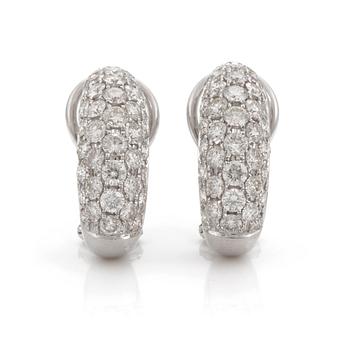 A pair of brilliant cut diamond earrings. Total carat weight 2.79 cts according to engraving.